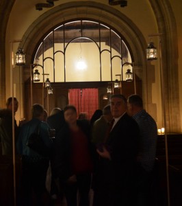 Socialising by candle light after the service